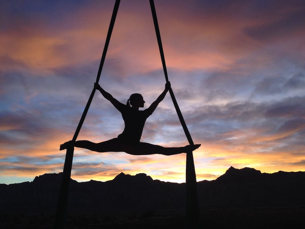 silhouette-aerialist-female-woman Woman Doing Yoga